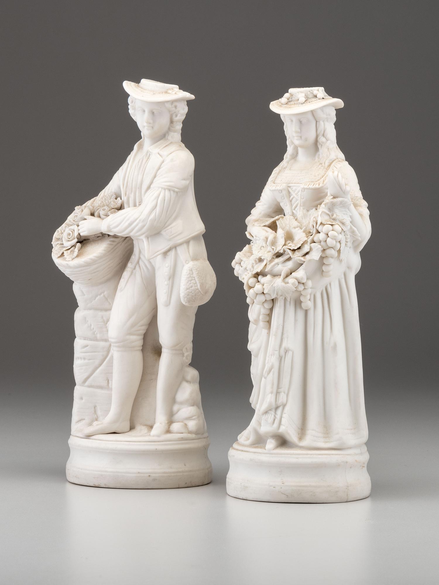 A Pair of Bisque Porcelain Figures