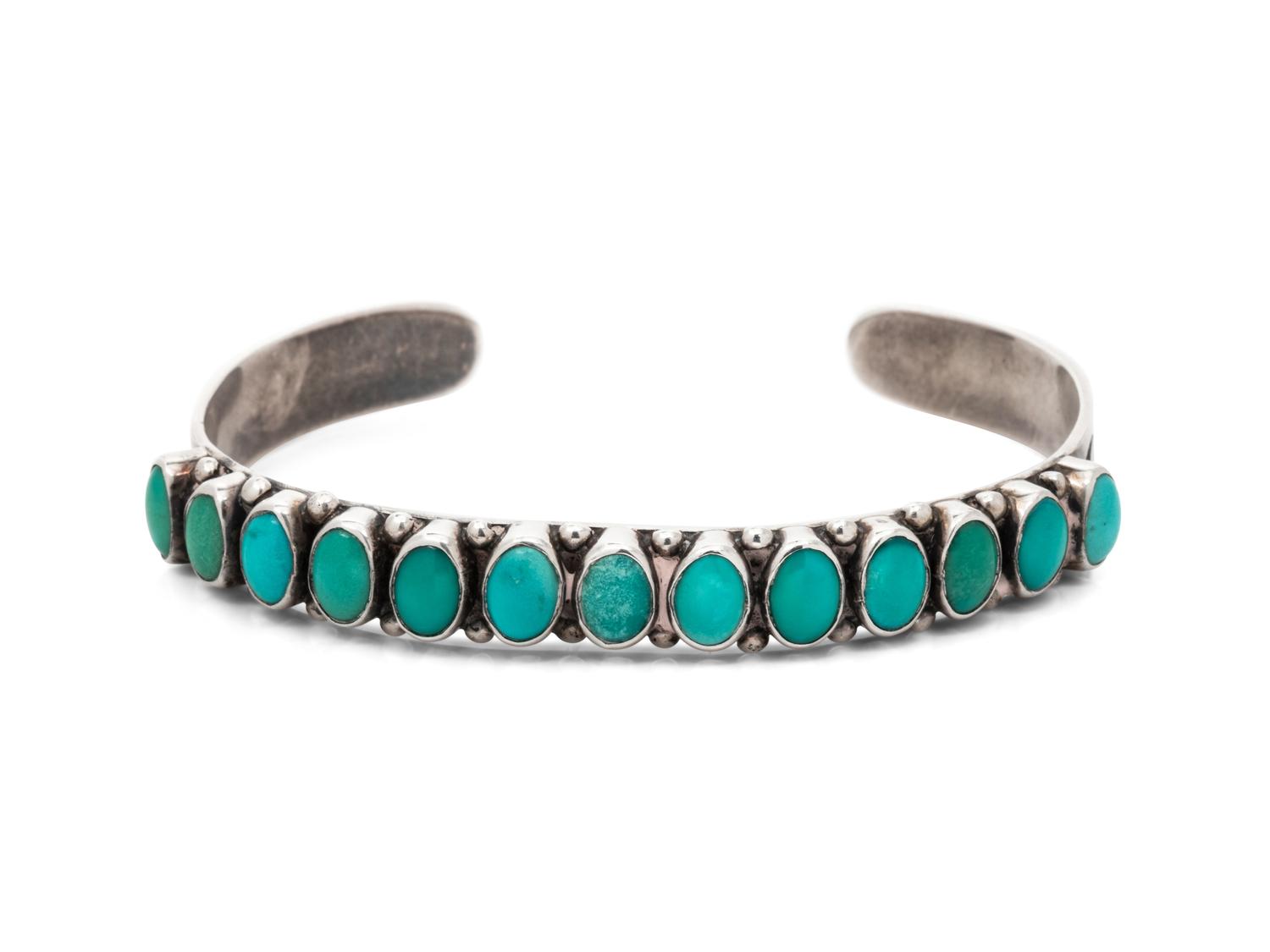 A Sterling Silver and Turquoise Bangle Bracelet, Leo Feeney,