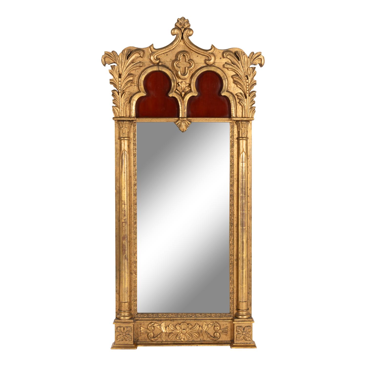 A Gothic Revival Giltwood and Gesso Pier Glass.