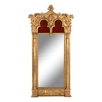 A Gothic Revival Giltwood and Gesso Pier Glass.