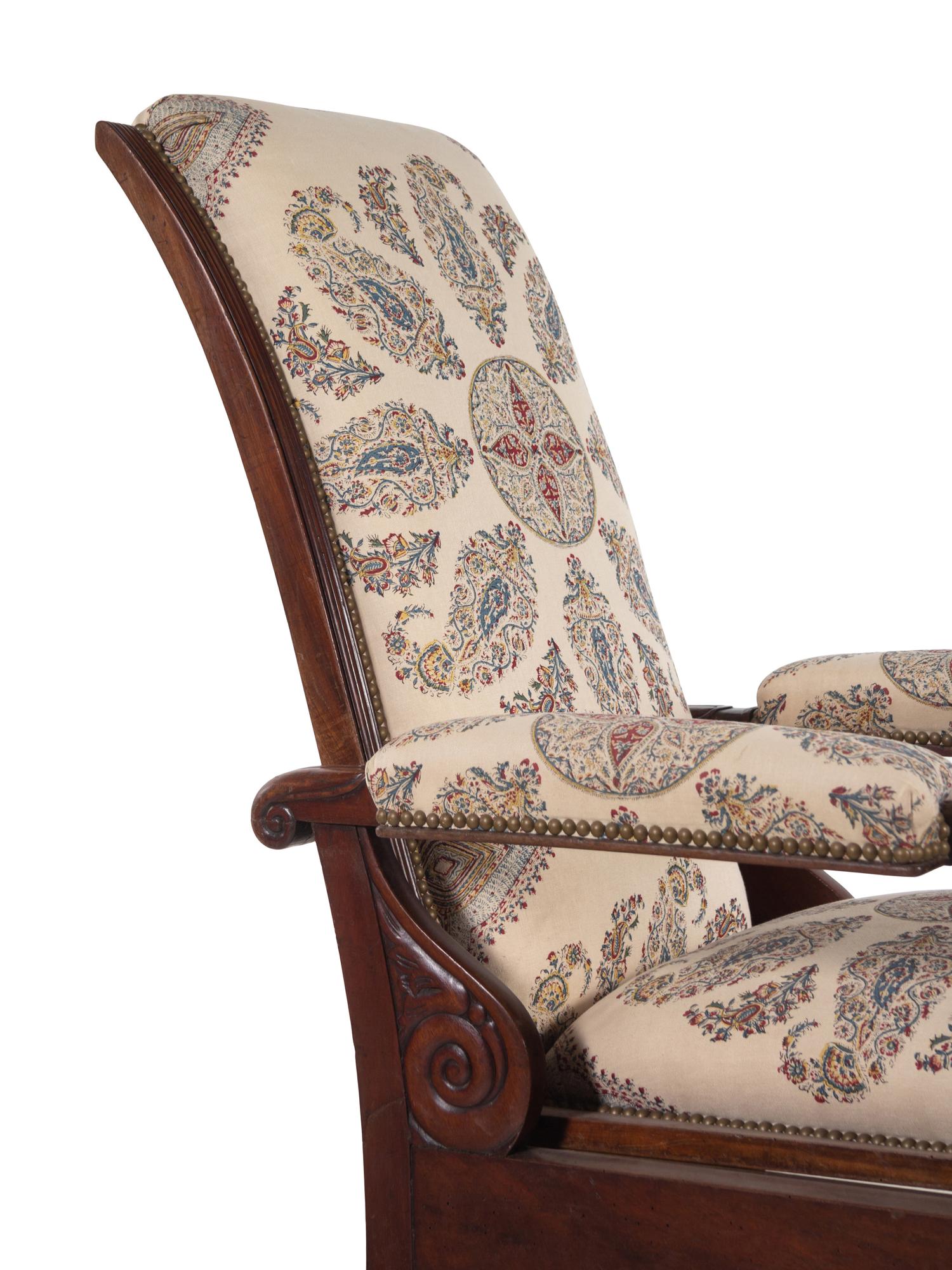 A Mahogany Reclining Armchair with Pull-Out Footrest
