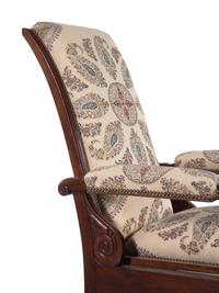 A Mahogany Reclining Armchair with Pull-Out Footrest