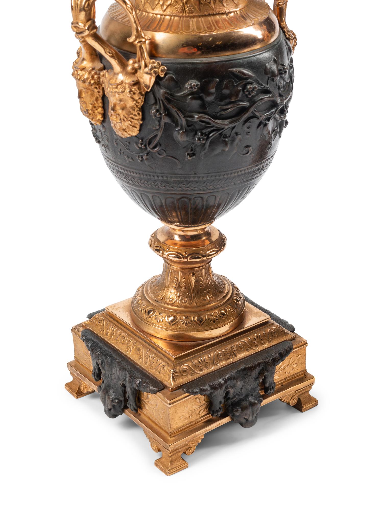 A Pair of Napoleon III Gilt and Patinated Bronze Four-Light Candelabra