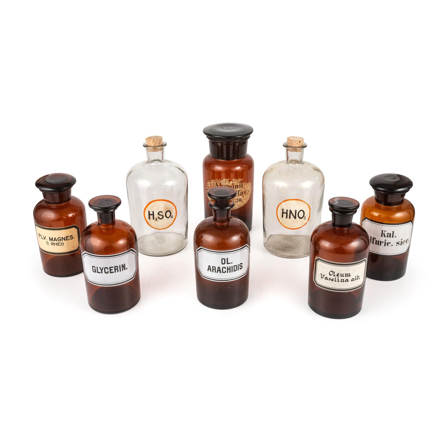 Eight Amber and Colorless Glass Apothecary Jars