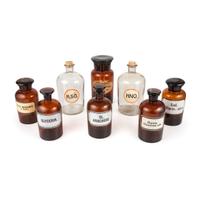 Eight Amber and Colorless Glass Apothecary Jars