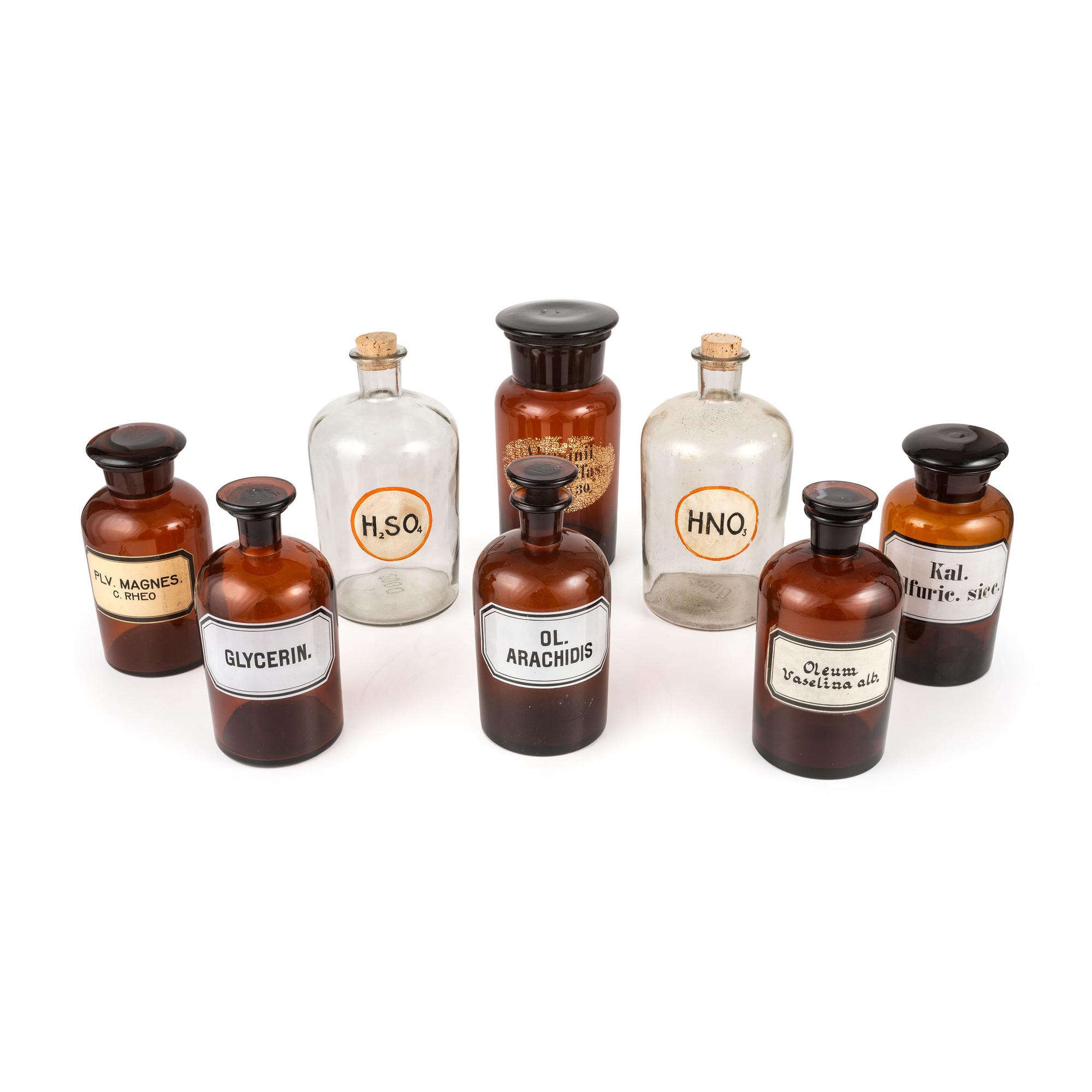 Eight Amber and Colorless Glass Apothecary Jars