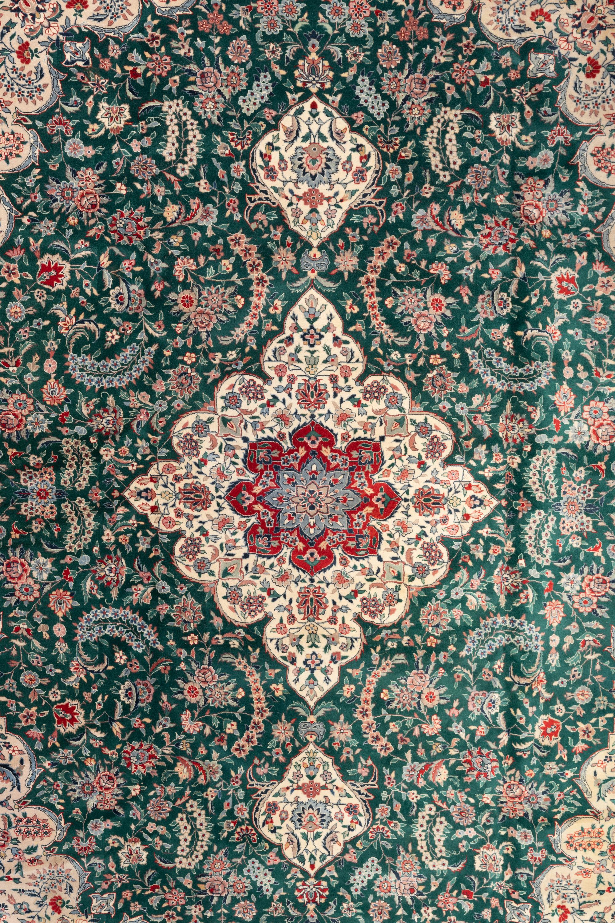 A Tabriz Wool Rug