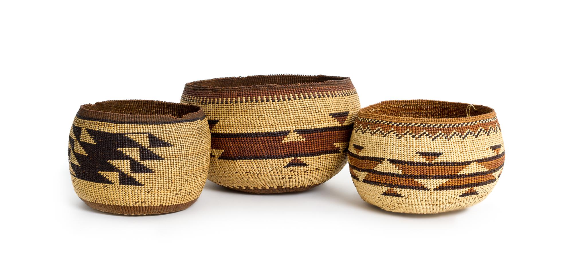Three Finely Woven Hupa Baskets Height of largest 3 1/2 x diameter 5 1/4 inches.