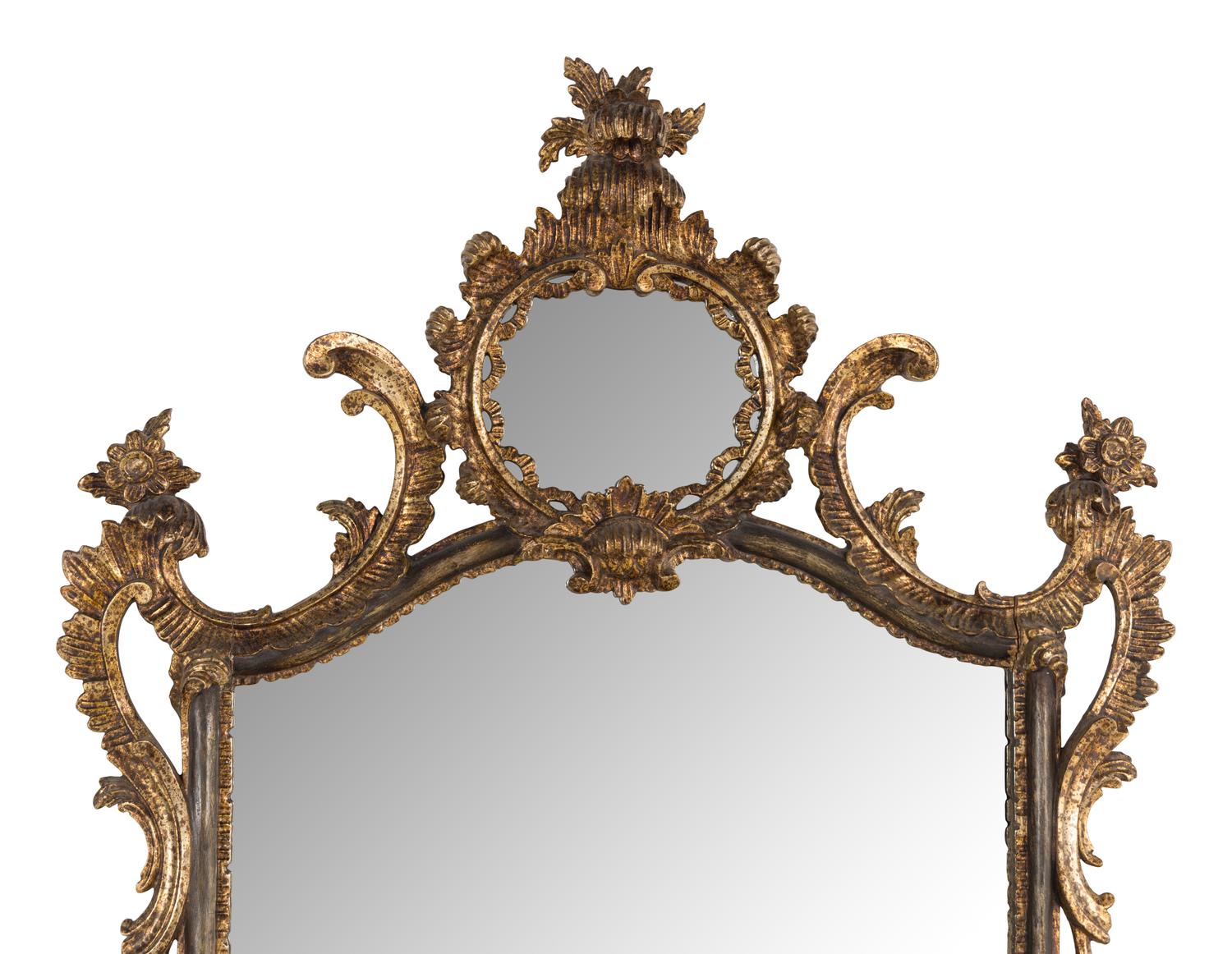 An Italian Baroque Style Giltwood Mirror
