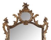An Italian Baroque Style Giltwood Mirror