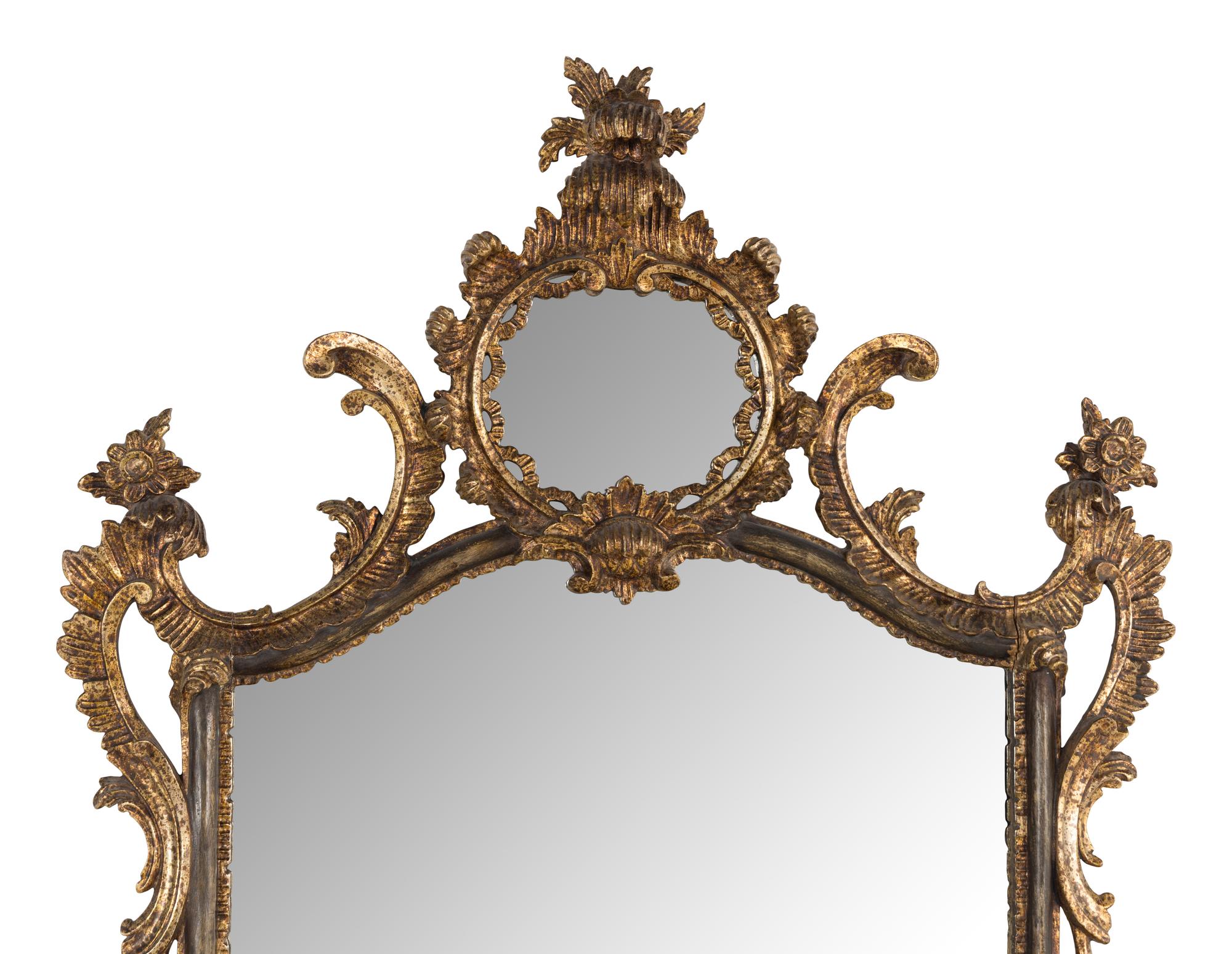 An Italian Baroque Style Giltwood Mirror