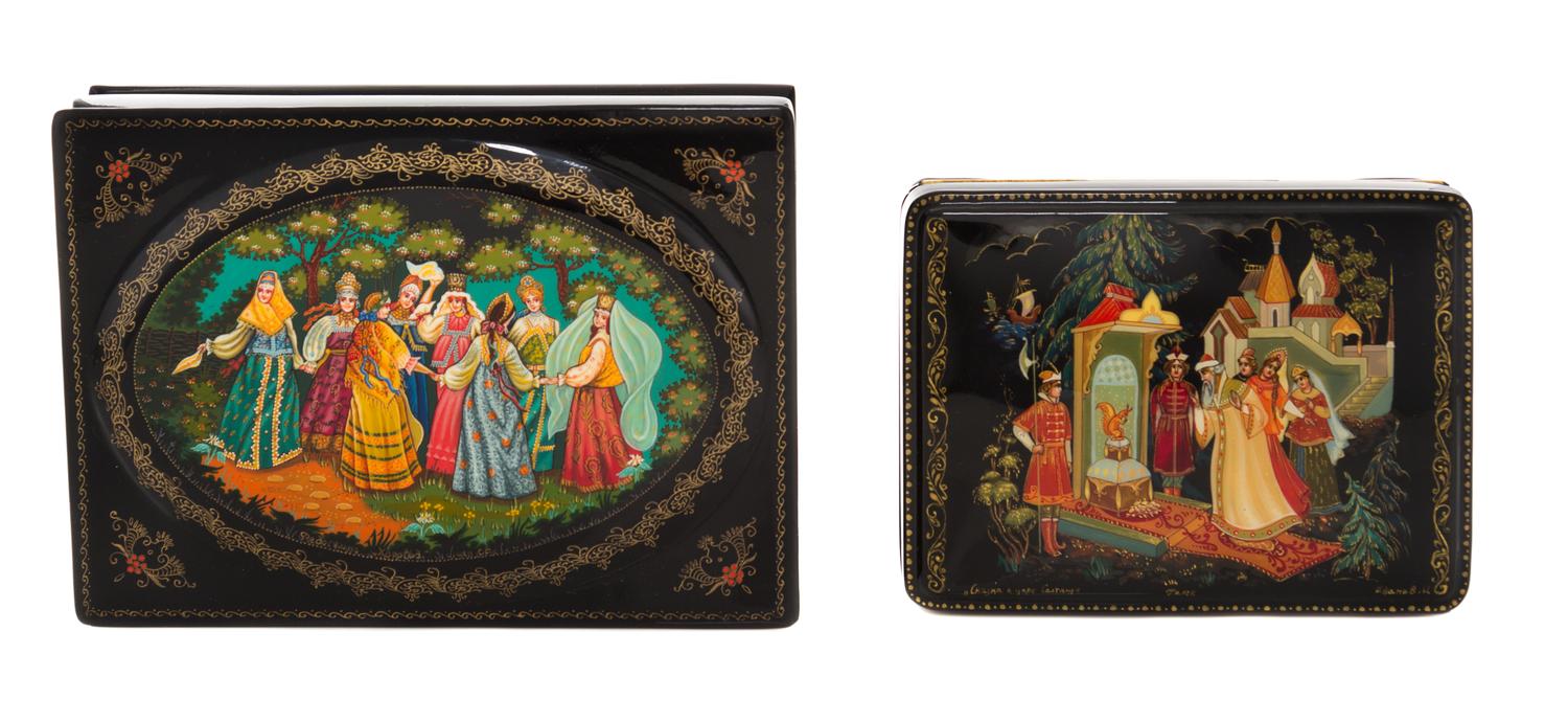 A Collection of Four Russian Lacquered Boxes, 20th Century, each of rectangular form with hinged lid, decorated with folk scenes.