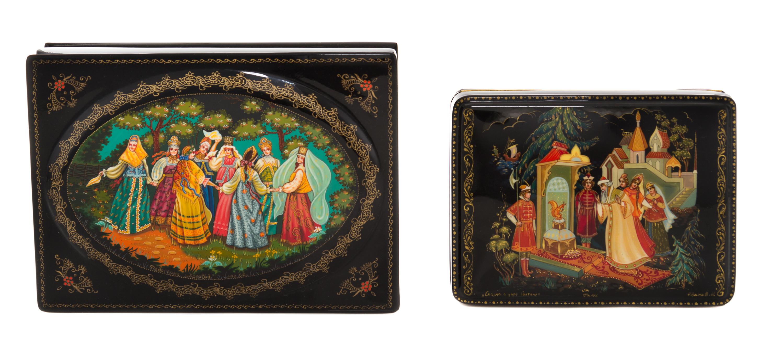 A Collection of Four Russian Lacquered Boxes, 20th Century, each of rectangular form with hinged lid, decorated with folk scenes.