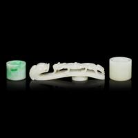 Two Chinese Jade and Jadeite Archer's Rings and a Jade 'Dragon' Belt Hook, Qing Dynasty 清 白玉、翡翠扳指及龍鈎一組三件