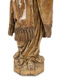 A Continental Carved Polychrome and Gilt Wood Figure
