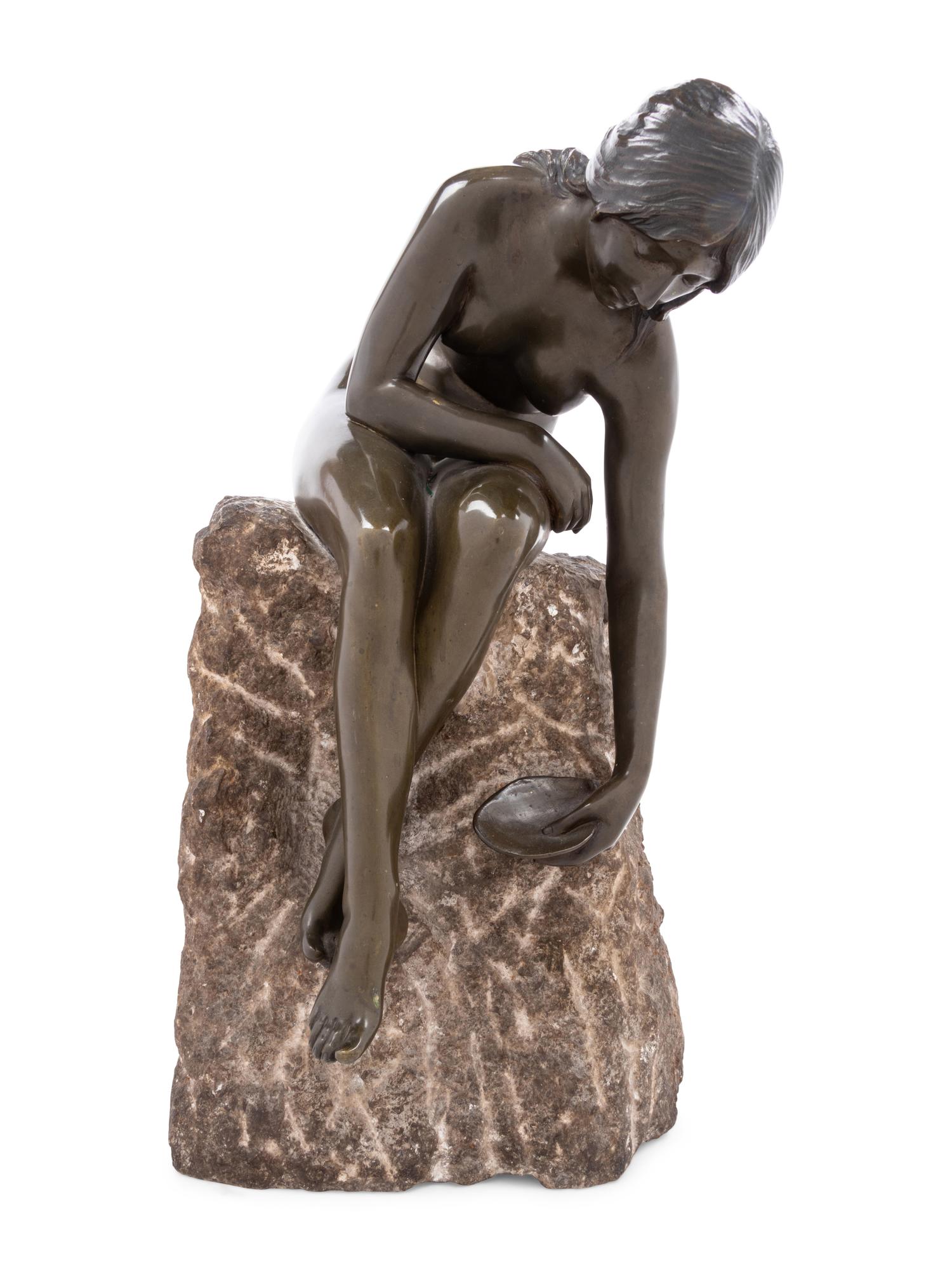 A Continental Patinated Bronze of a Seated Nude