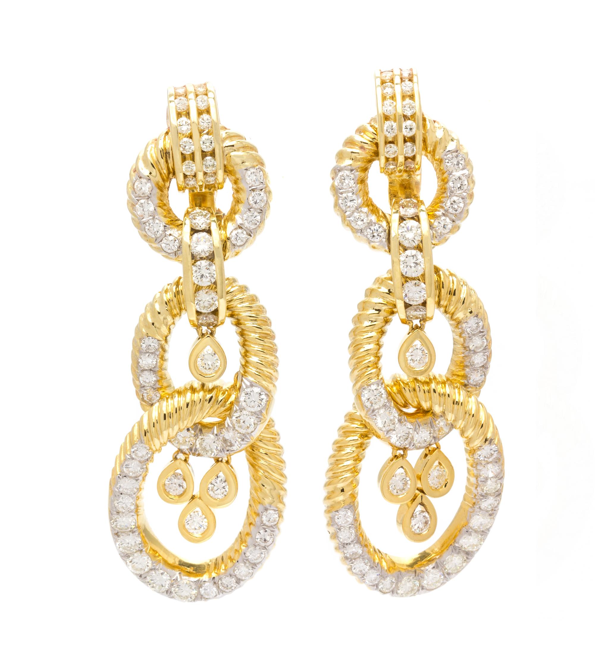 A Pair of 14 Karat Yellow Gold and Diamond Pendant Earrings, 18.70 dwts.