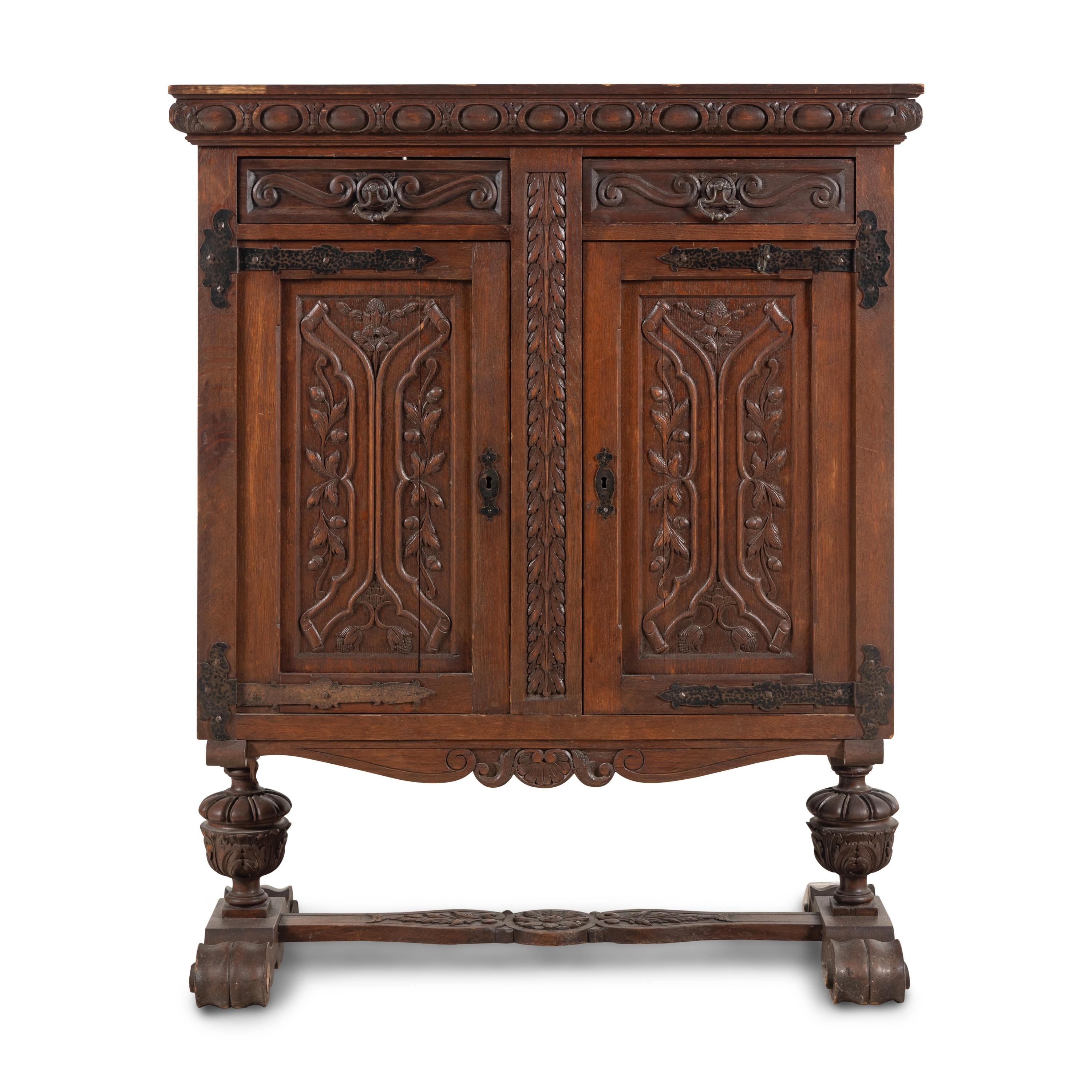A Renaissance Revival Oak Cabinet