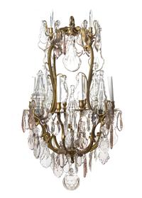 A Louis XV Style Gilt Bronze Eight-Light Chandelier, Height 44 x diameter 24 inches.