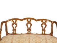 A Continental Painted and Giltwood Settee