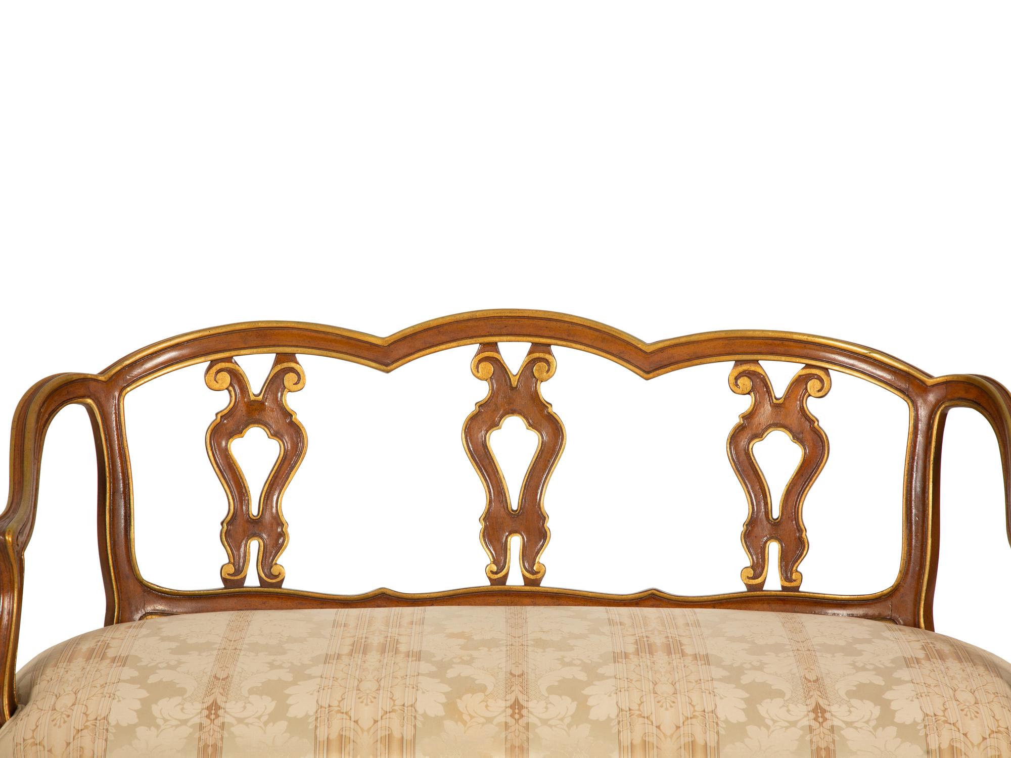 A Continental Painted and Giltwood Settee