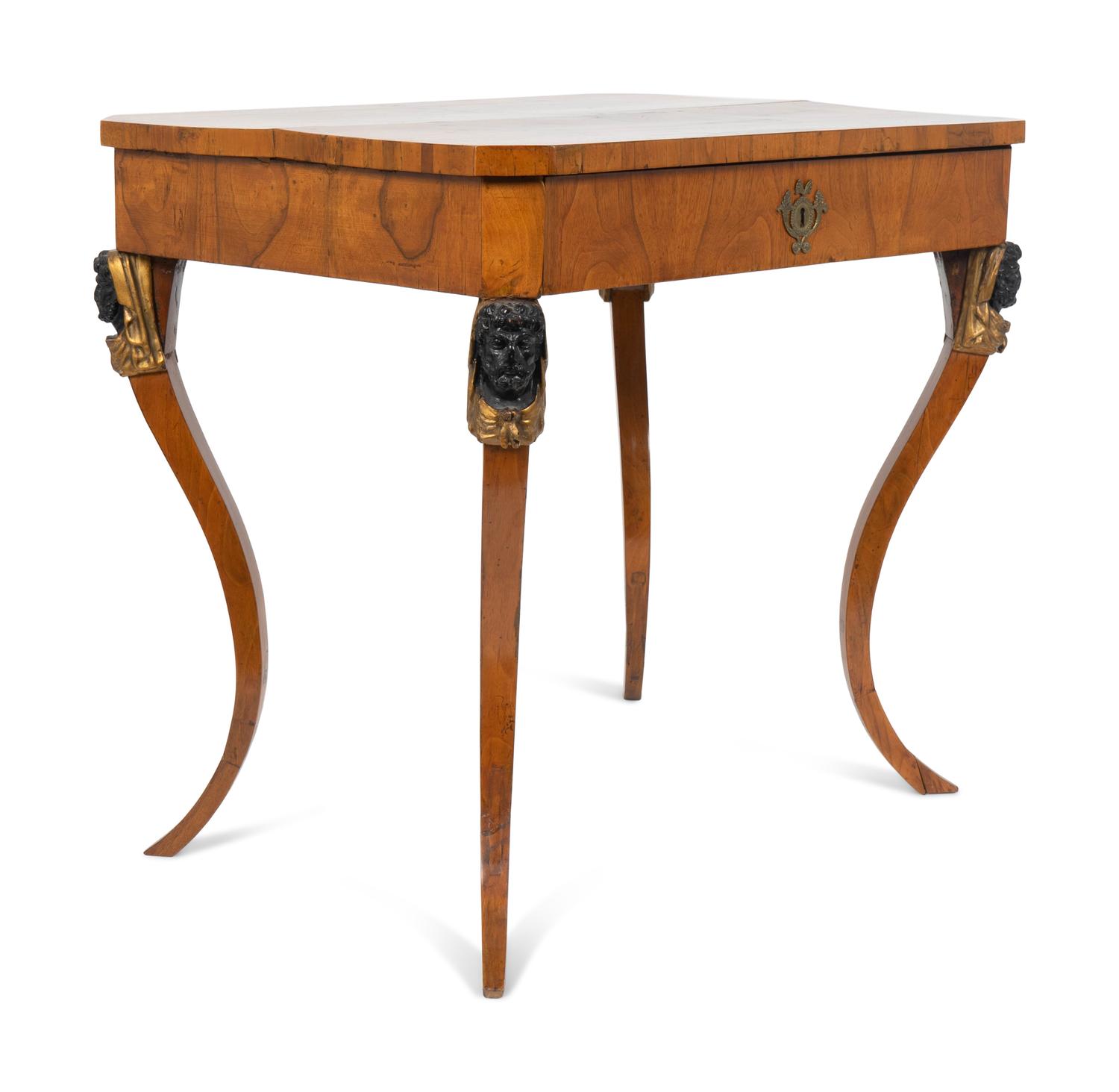 A Biedermeier Walnut Painted, Ebonized and Parcel Gilt Side Table — EARLY 19TH CENTURY