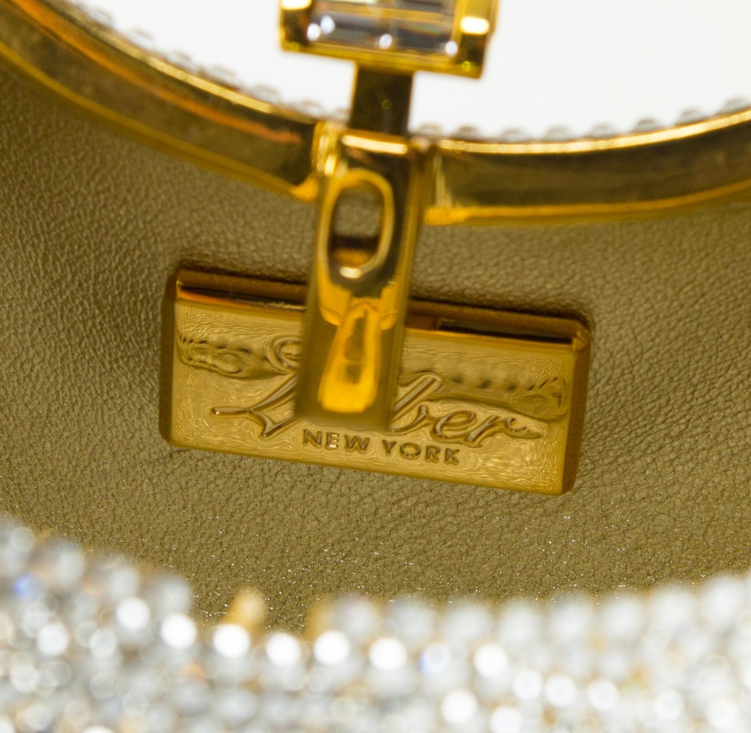 A Judith Leiber Clear Crystal Minaudiere, 6" x 4.5" x 2".