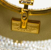 A Judith Leiber Clear Crystal Minaudiere, 6" x 4.5" x 2".