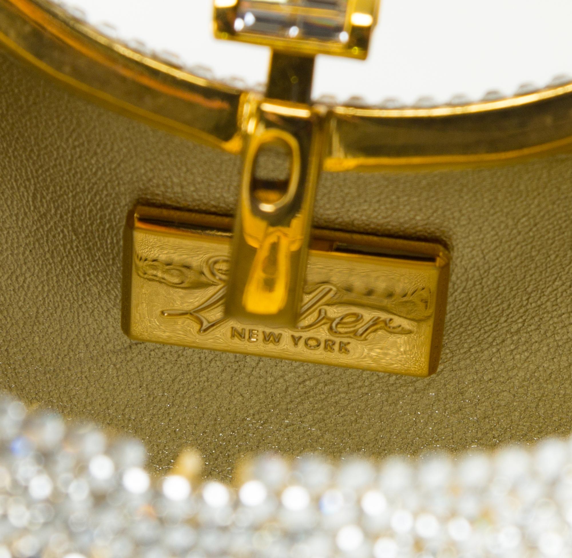A Judith Leiber Clear Crystal Minaudiere, 6" x 4.5" x 2".