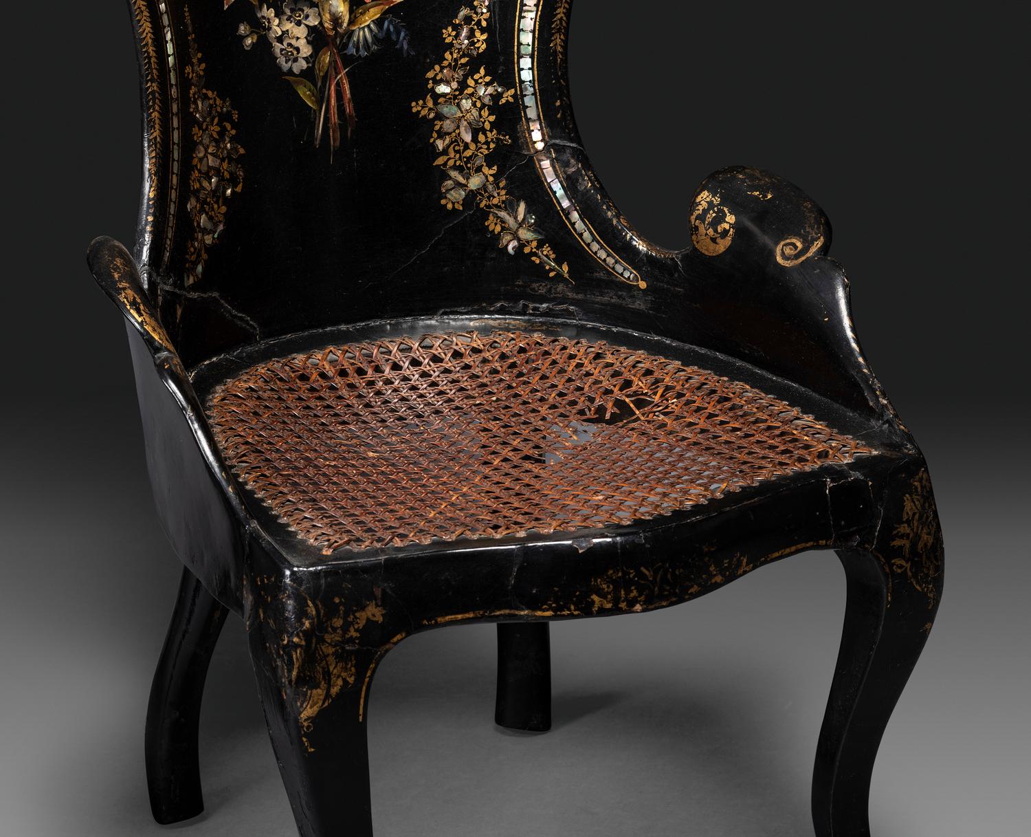 Two Victorian Black Lacquered Parcel-Gilt and Mother-of-Pearl Inlaid Cane Upholstered Slipper Chairs