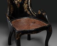 Two Victorian Black Lacquered Parcel-Gilt and Mother-of-Pearl Inlaid Cane Upholstered Slipper Chairs