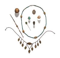 Twenty Egyptian Faience and Steatite Scarabs Mounted as Eight Revival Jewelry Items