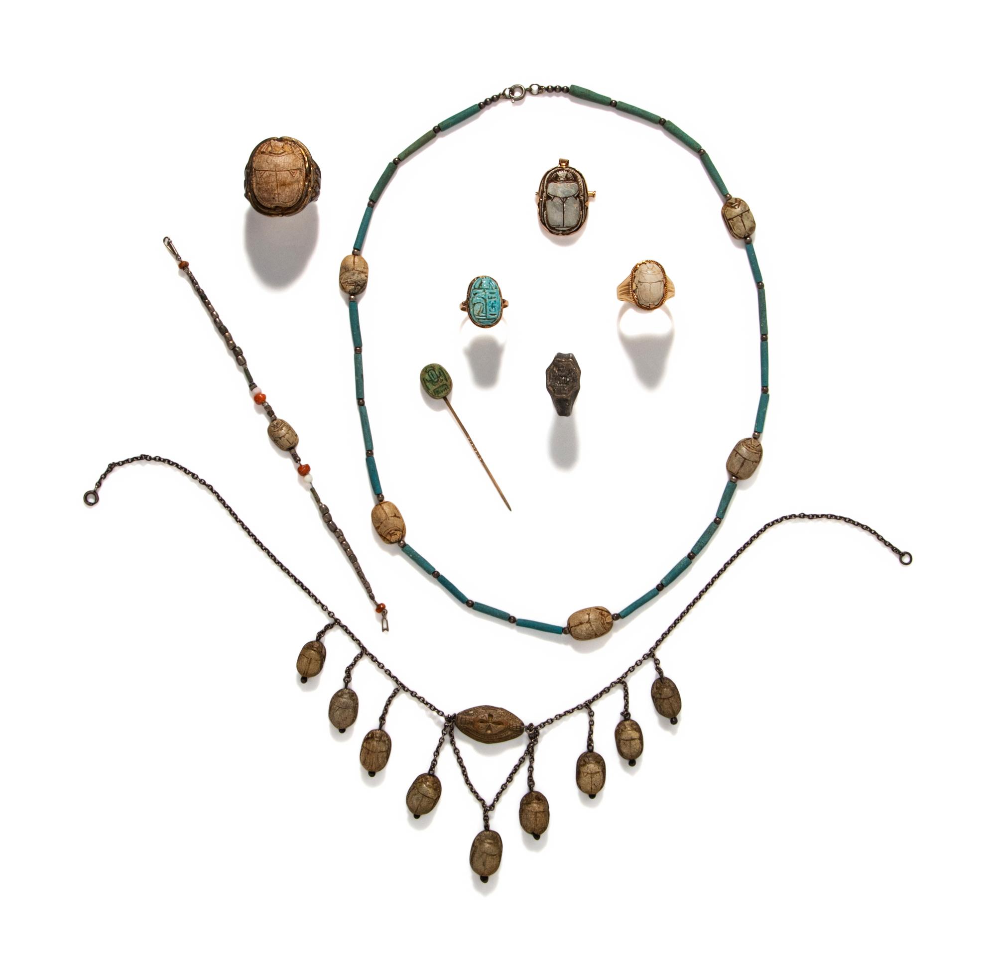 Twenty Egyptian Faience and Steatite Scarabs Mounted as Eight Revival Jewelry Items