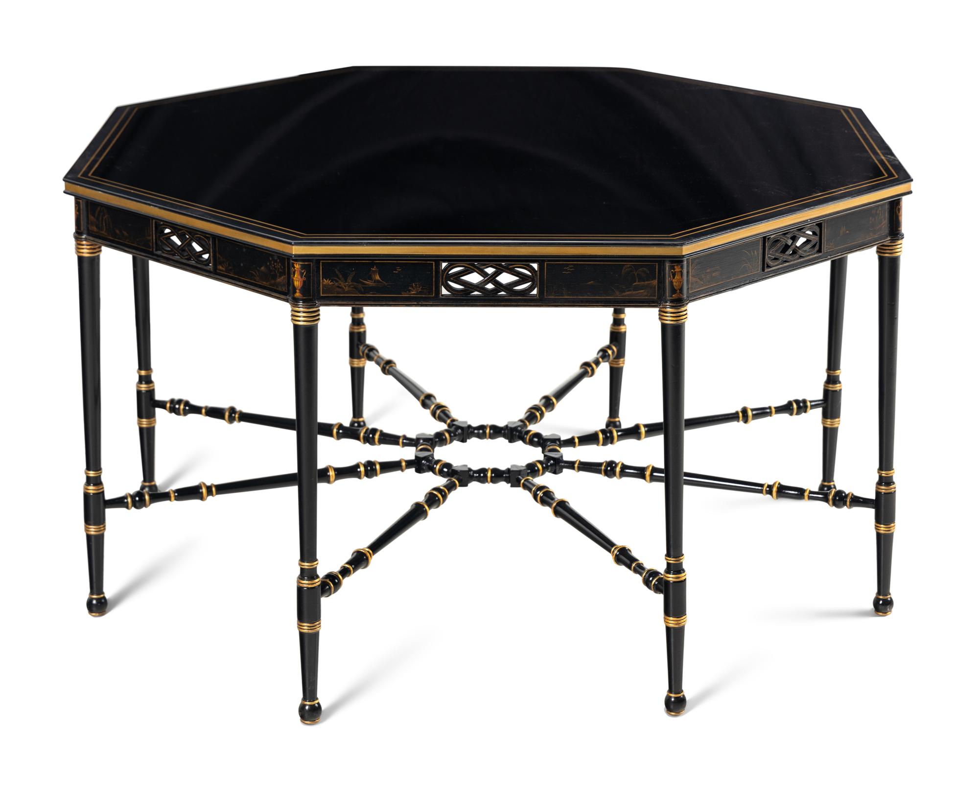 A Regency Style Ebonized and Parcel Gilt Center Table