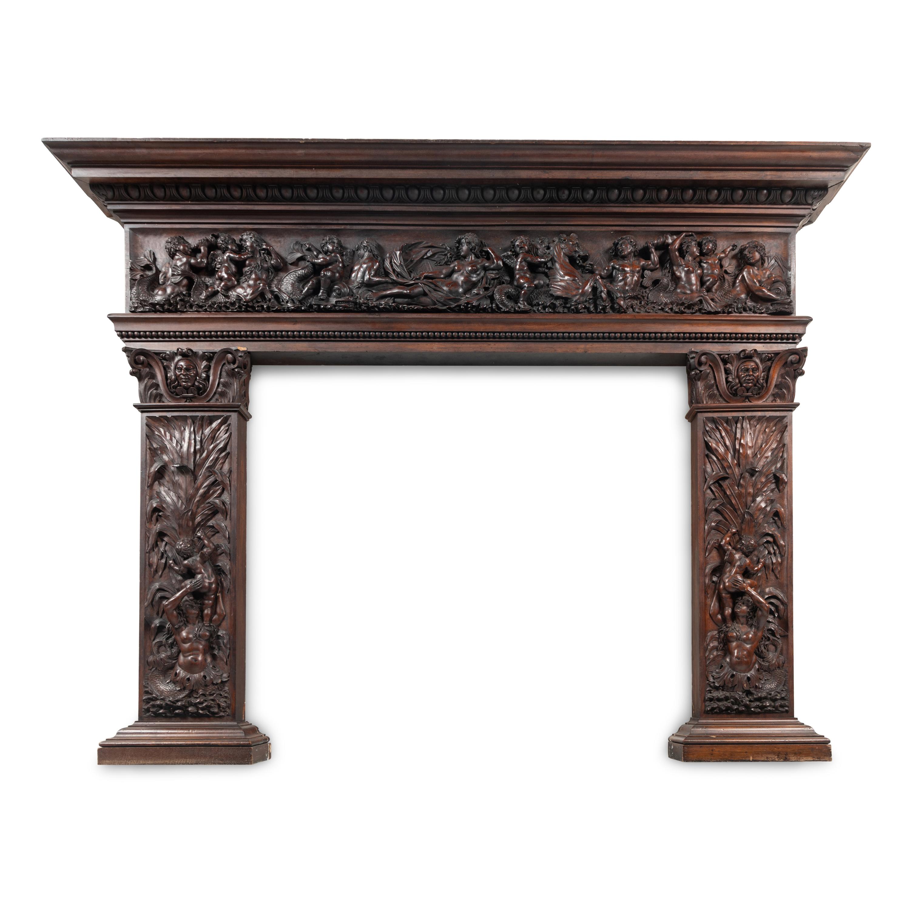 An Italian Carved Walnut Mantelpiece