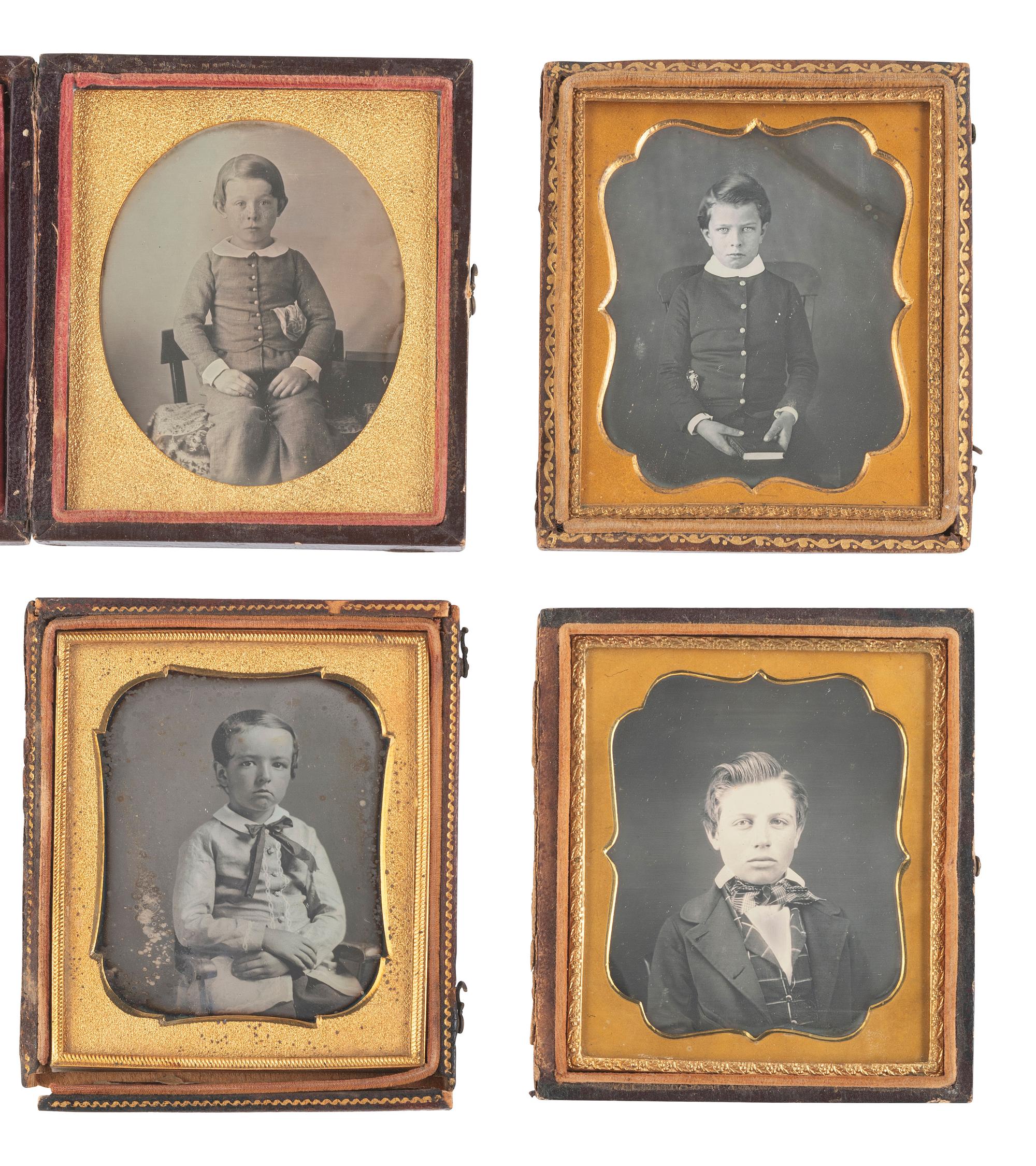 [EARLY PHOTOGRAPHY]. 14 sixth plate daguerreotypes of rather serious male children.