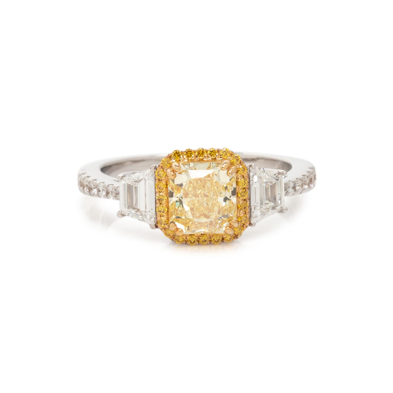 FANCY INTENSE YELLOW DIAMOND AND DIAMOND RING