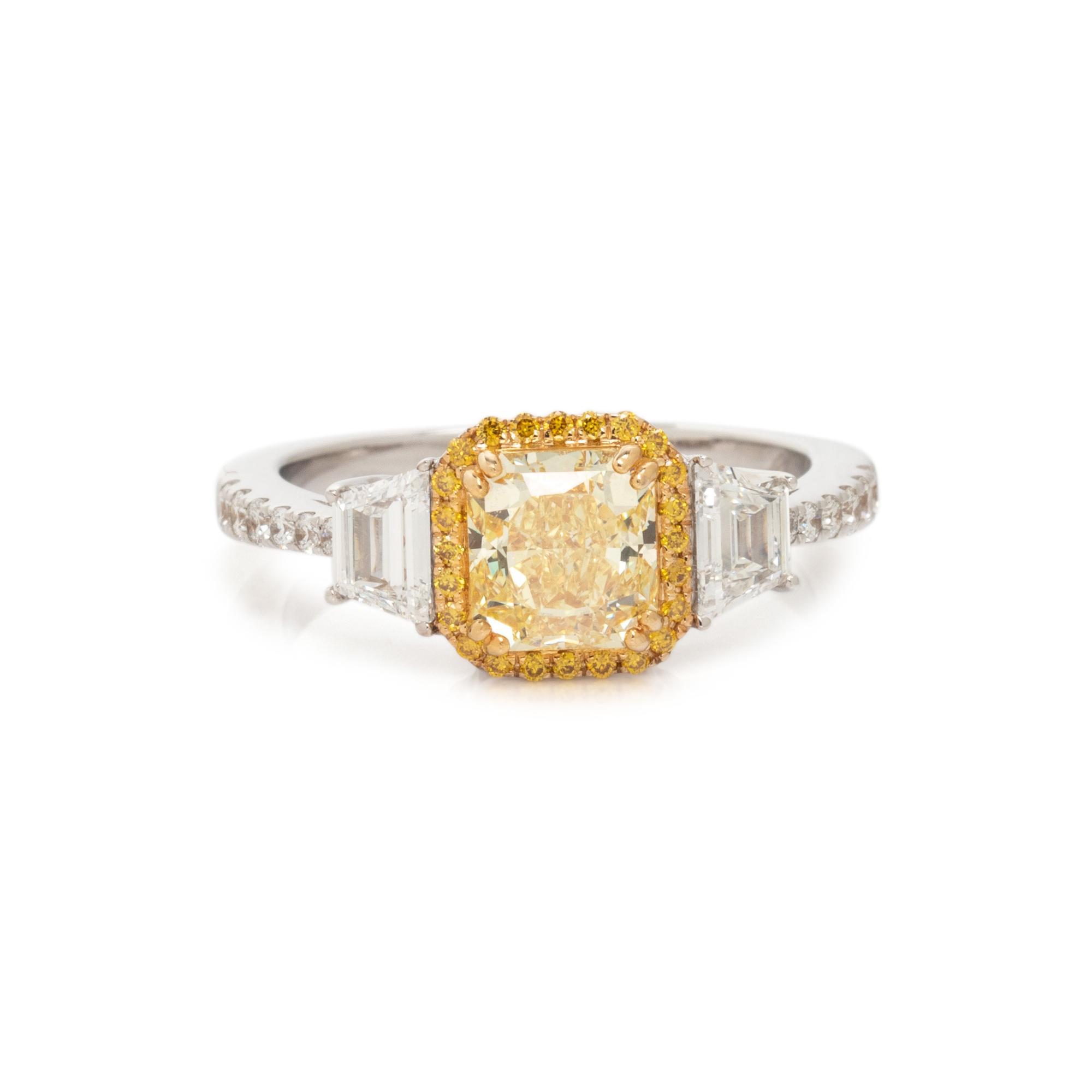 FANCY INTENSE YELLOW DIAMOND AND DIAMOND RING