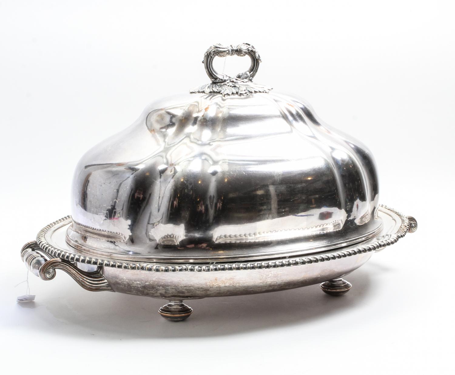 A Silver-Plate Cloche. Width over handles 26 1/2 inches.