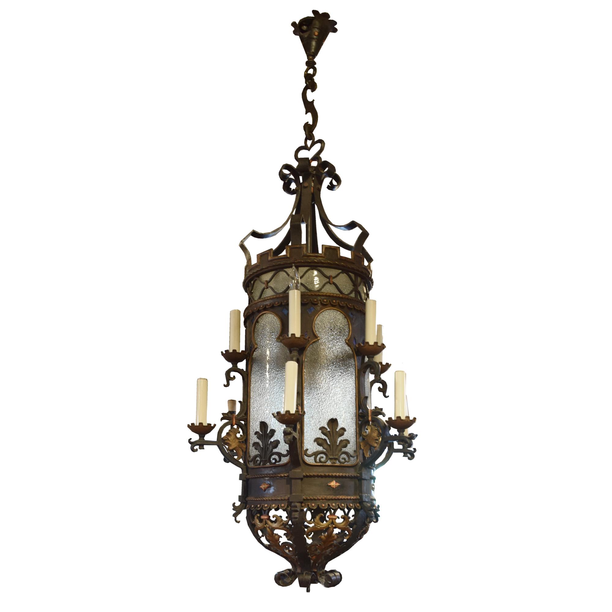 A Bronze and Iron Chandelier from a Chicago Theatre 28" W x 28" D x 75" H — United States, 20th Century