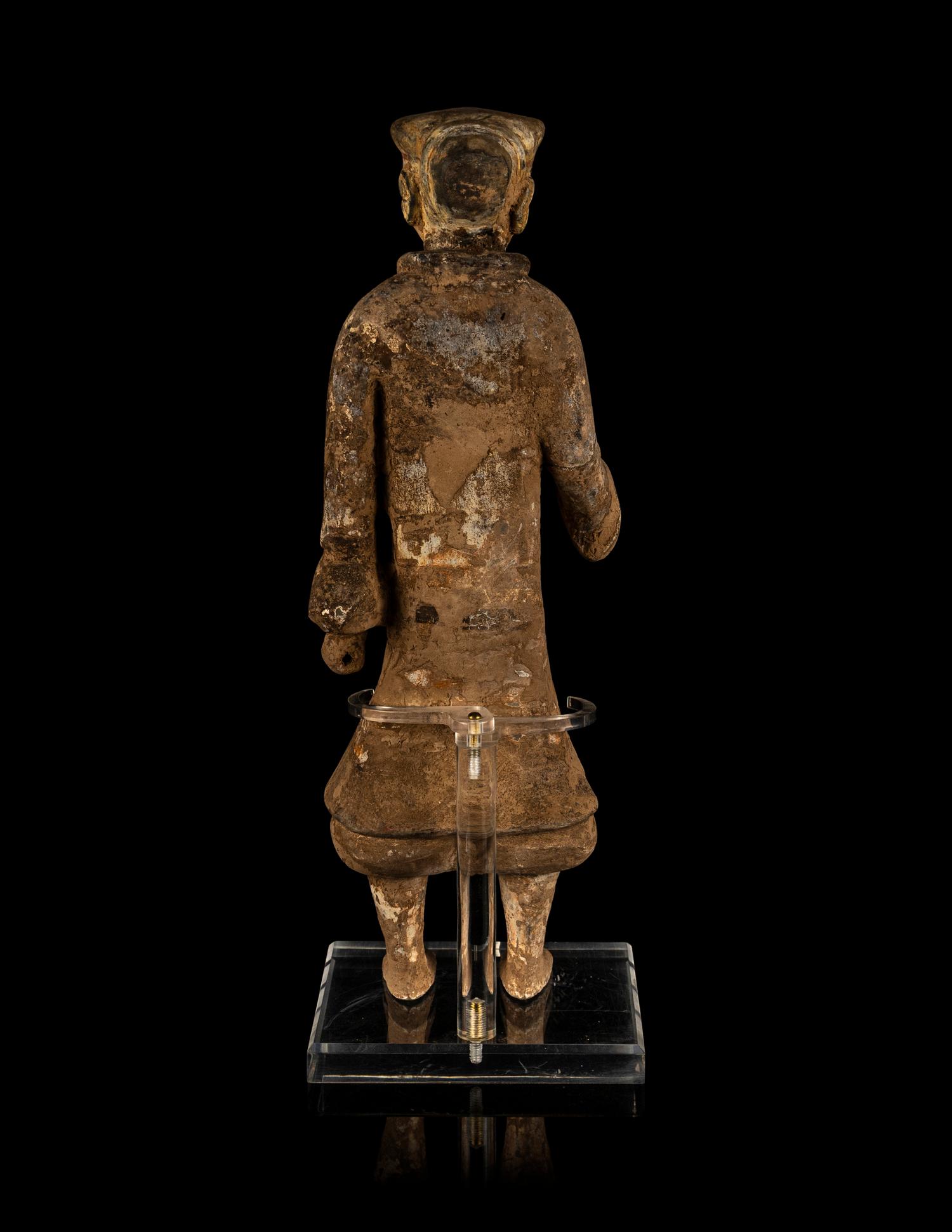 A Chinese Painted Grey Pottery Figure of a Figure