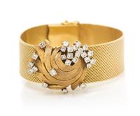 An 18 Karat Yellow Gold and Diamond Surprise Watch, Bucherer, 37.20 dwts.