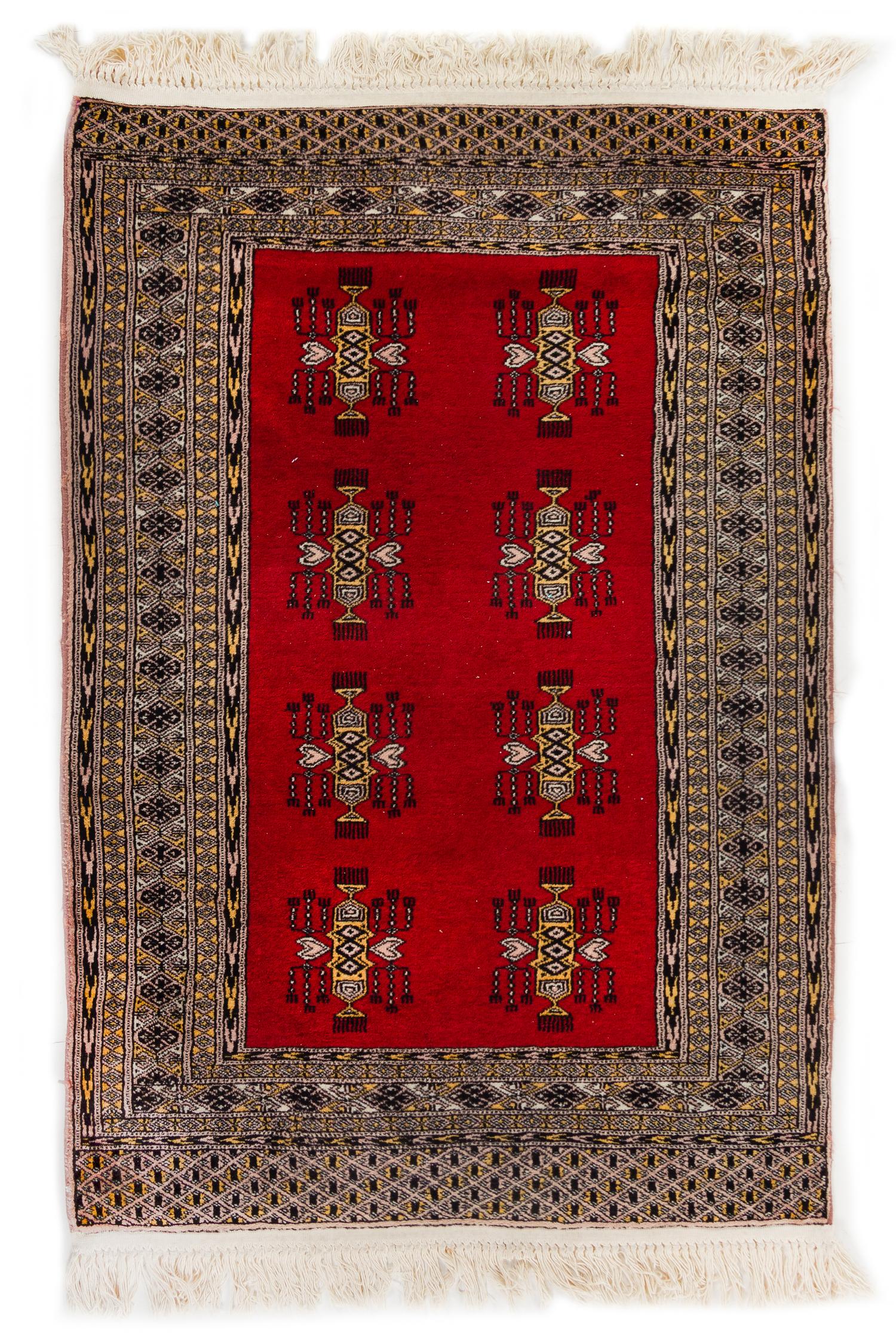 A Pakistani Wool Rug 4 feet 7 inches x 3 feet 2 inches. — 20TH CENTURY