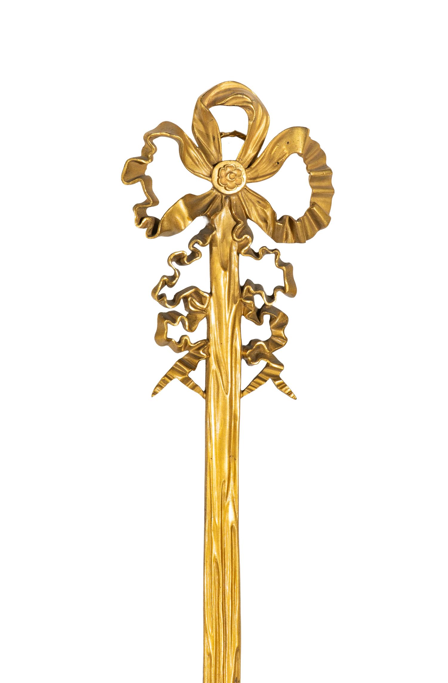 A French Gilt Bronze, Blue Steel, and Enamel Cartel d'Applique and Barometer