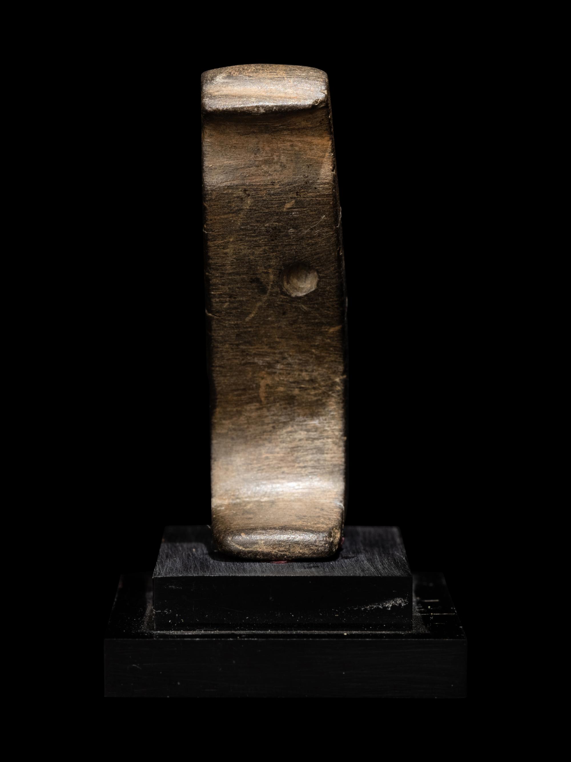 An Egyptian Stone Inlay of the hieroglyph "Hou"