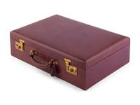 A French Leather Cased Enameled Silver Toiletry Set