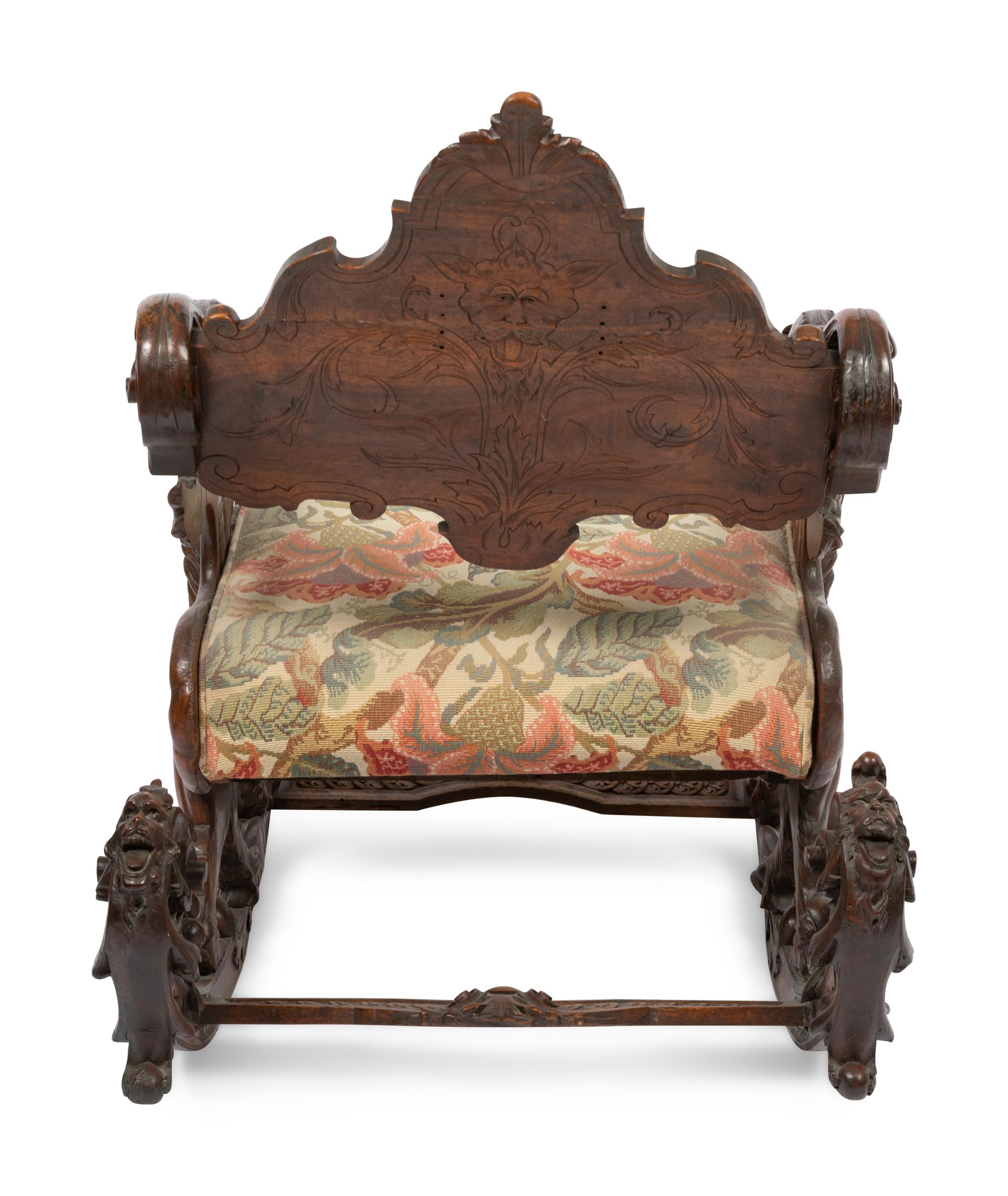 An Italian Carved Walnut Fantasy Rocking Chair