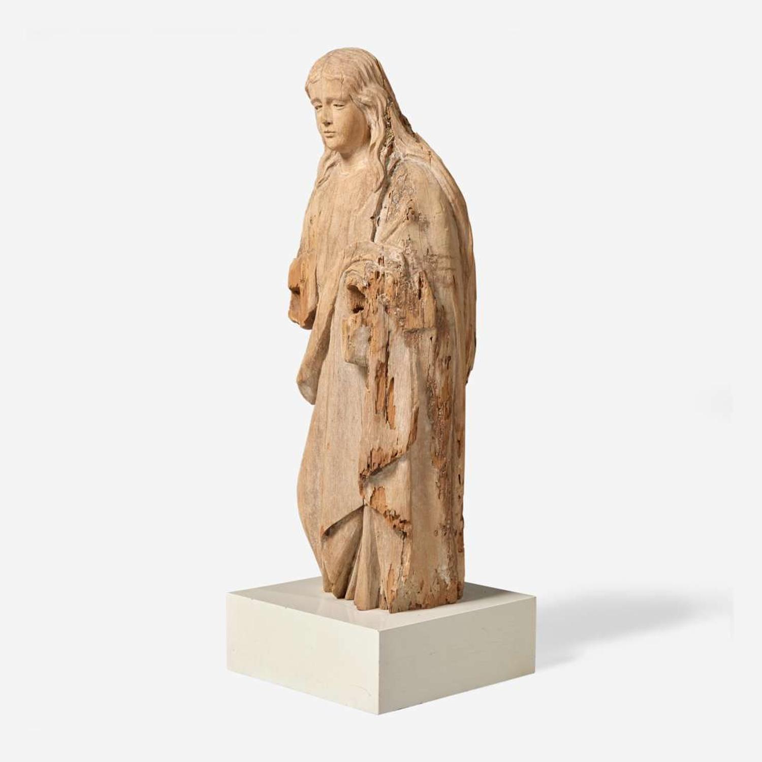 A carved wood figure of a saint Continental, 16th / 17th century