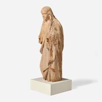 A carved wood figure of a saint Continental, 16th / 17th century