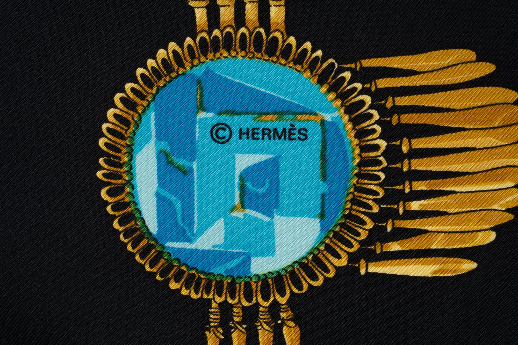 Three Hermès Scarves and One Cartier Scarf